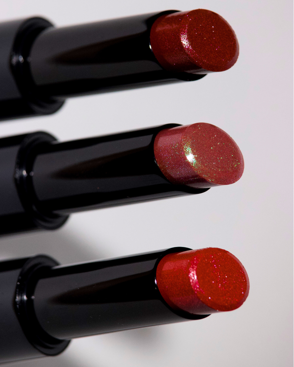 3 glitbalm lip balms in red nude and burgundy